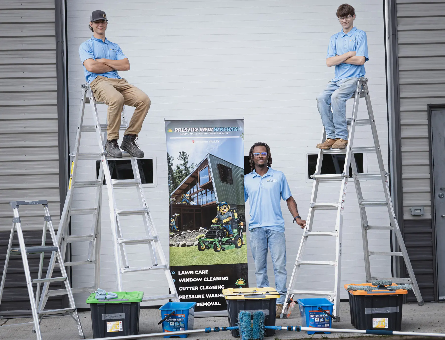 PVS crew setting up ladders on a job site