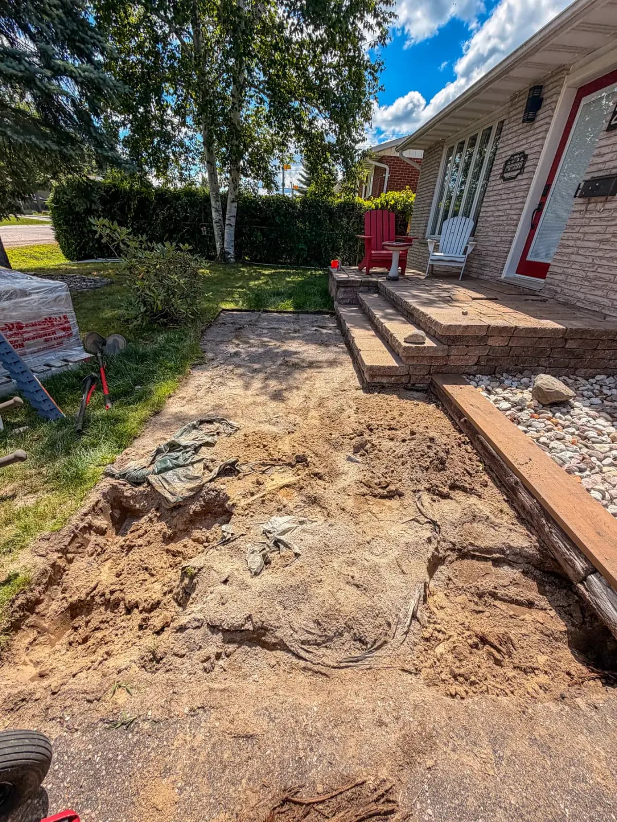 Front walkway fully excavated to a sand base ahead of new interlock pavers in Petawawa