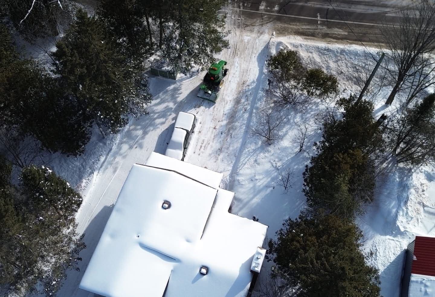 PVS SnowLand crew clearing a property after a snowfall — Ottawa Valley