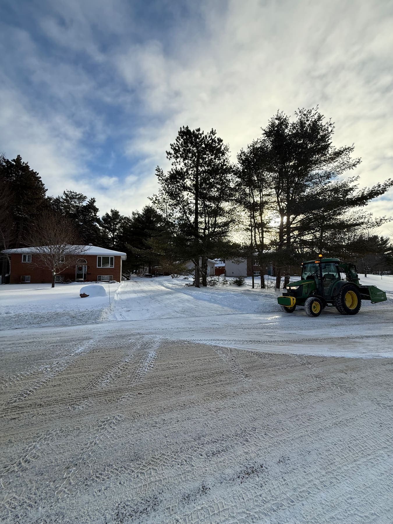 PVS SnowLand crew clearing a property after a snowfall — Ottawa Valley