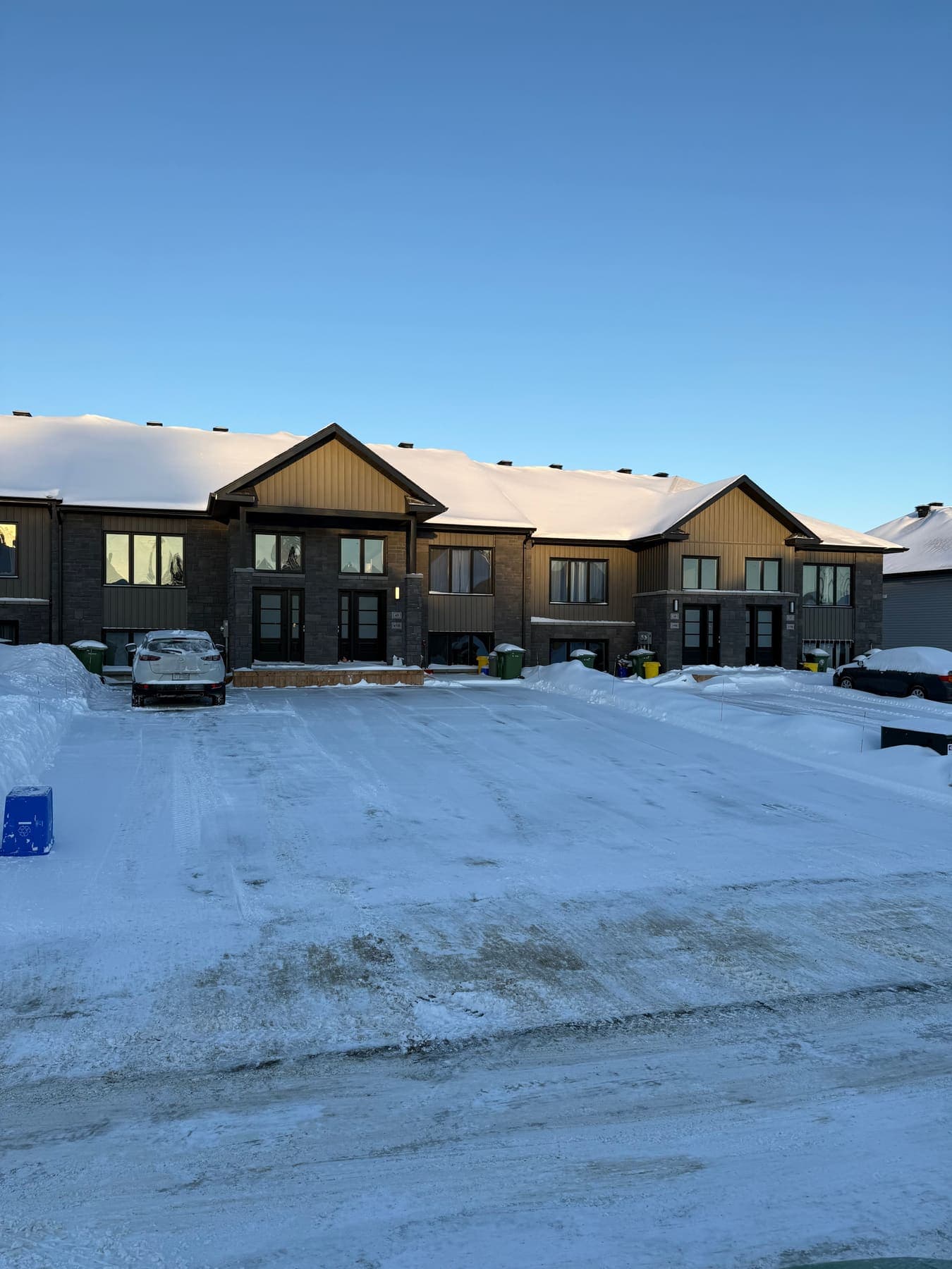PVS SnowLand crew clearing a property after a snowfall — Ottawa Valley