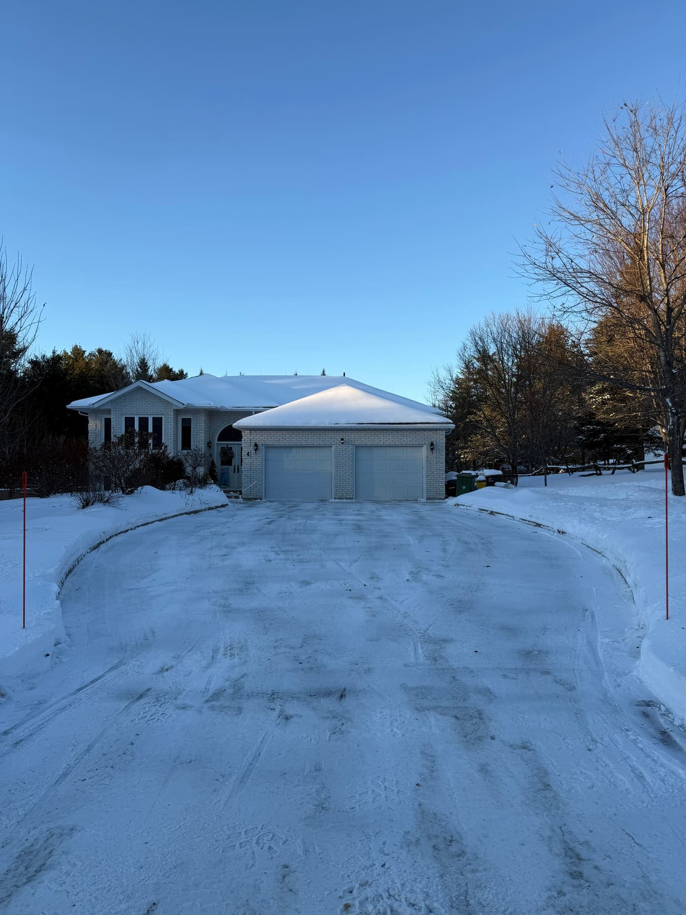 PVS SnowLand crew clearing a property after a snowfall — Ottawa Valley
