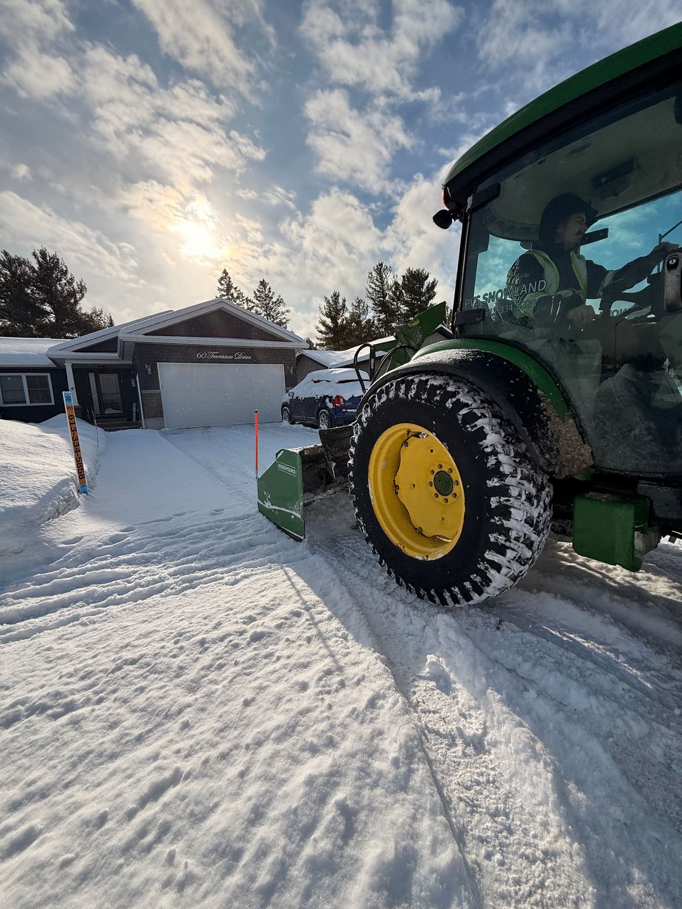 PVS SnowLand crew clearing a property after a snowfall — Ottawa Valley