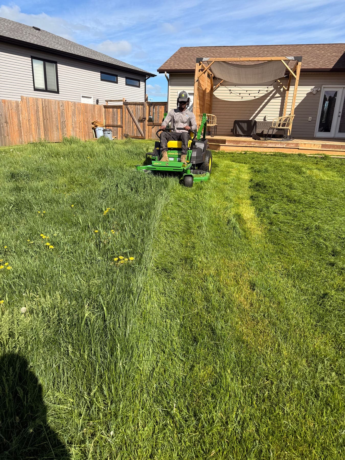 PVS LawnPros crew on a residential lawn — Ottawa Valley