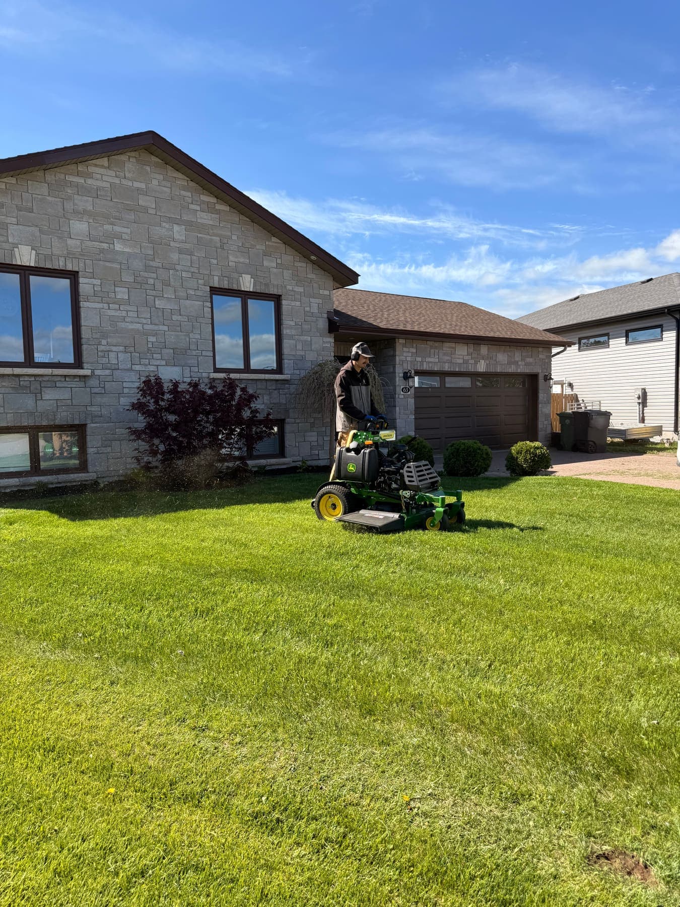 PVS LawnPros crew on a residential lawn — Ottawa Valley