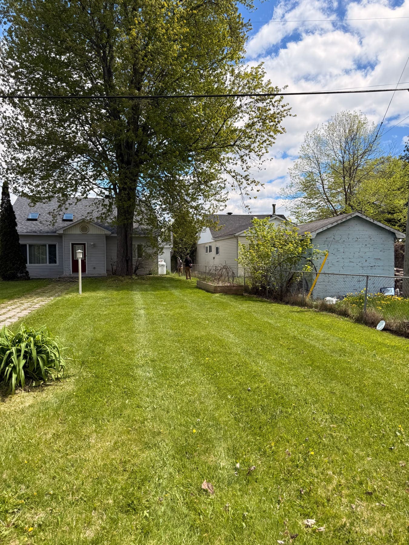 PVS LawnPros crew on a residential lawn — Ottawa Valley