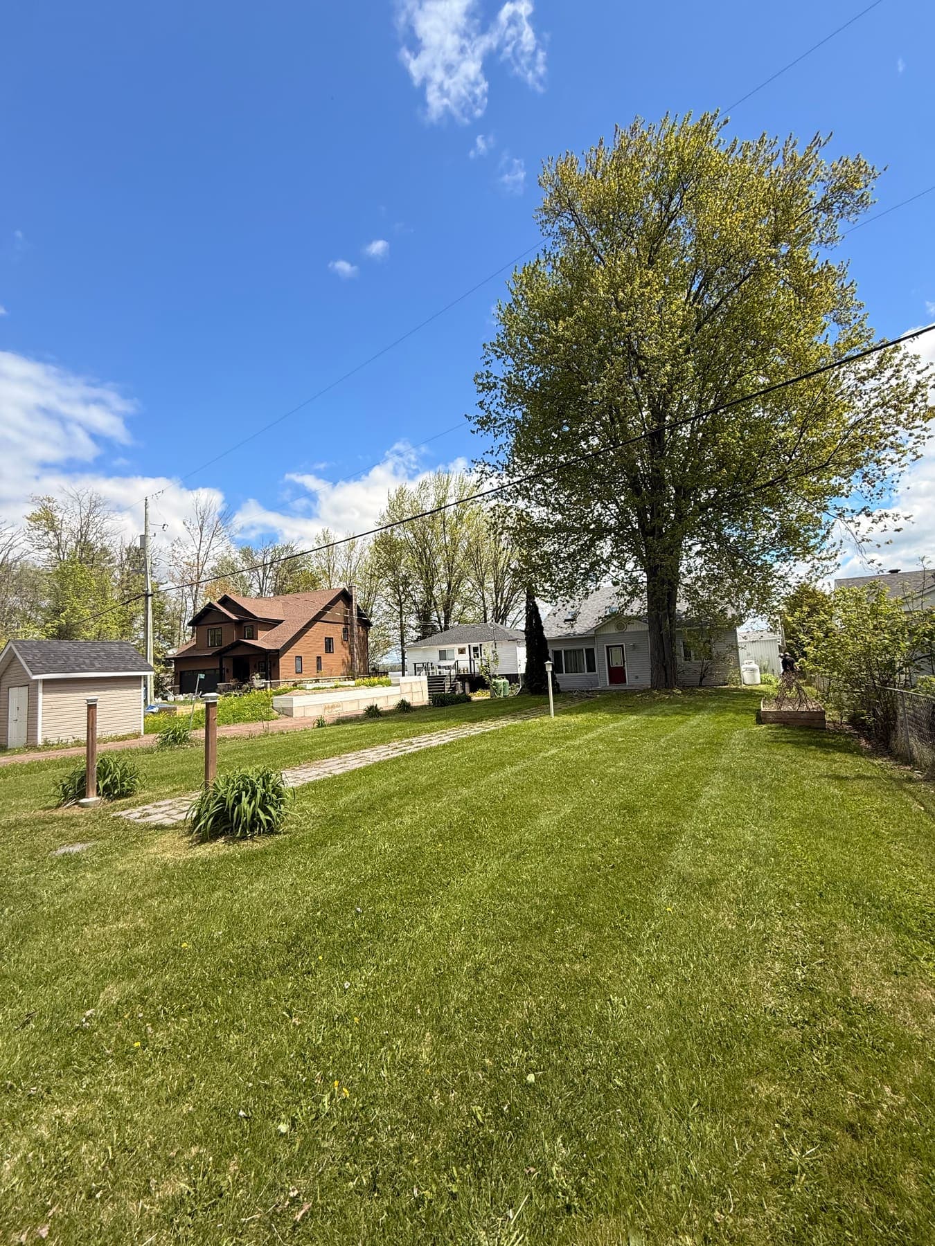 PVS LawnPros crew on a residential lawn — Ottawa Valley
