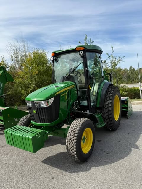 Professional John Deere tractor for snow removal - side view
